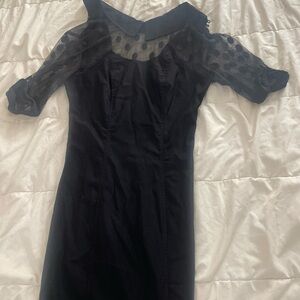 Elegant Black Dress with Sheer Polka Dot Sleeves
